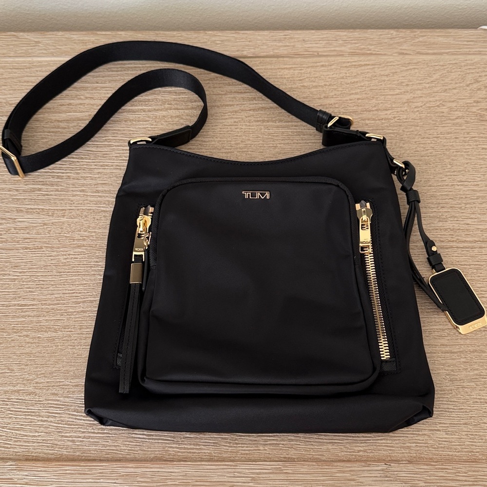TUMI Black and Gold Tyler Crossbody Bag